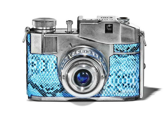 a fine art print of a Bencini Comet S retro camera on white